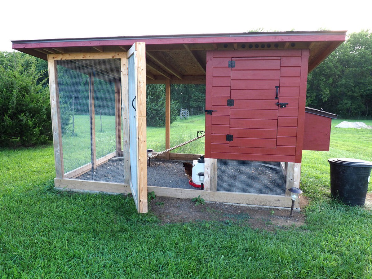 red chicken coop made of wood and screen red chicken coop made of wood and screen